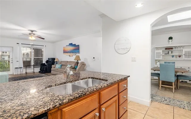 a kitchen with granite countertop a sink and a granite counter tops