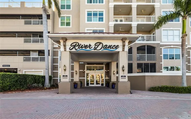 a front view of building with a entrance