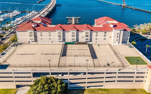 a view of multiple houses with a street