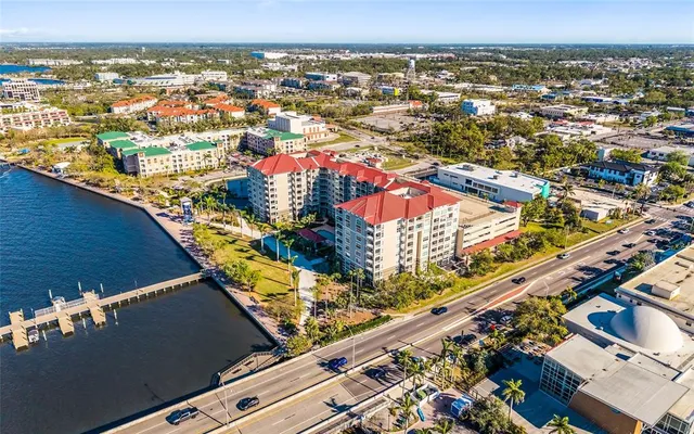 an aerial view of residential houses and city view