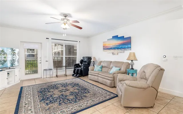 a living room with furniture and a rug