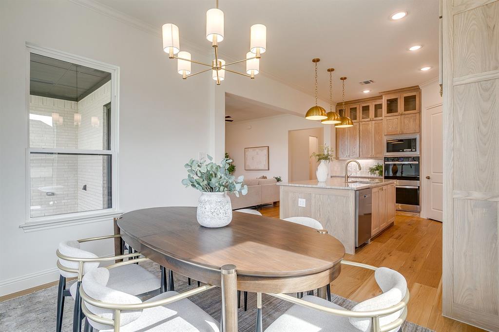 320 Slimp Bluff Azle, TX 76020 - Photo 19 of 37 a kitchen with a table and chairs