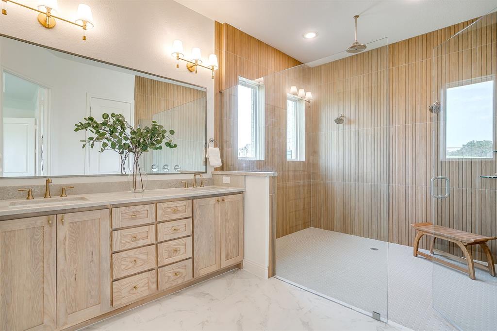 320 Slimp Bluff Azle, TX 76020 - Photo 23 of 37 a bathroom with a double vanity sink and a mirror