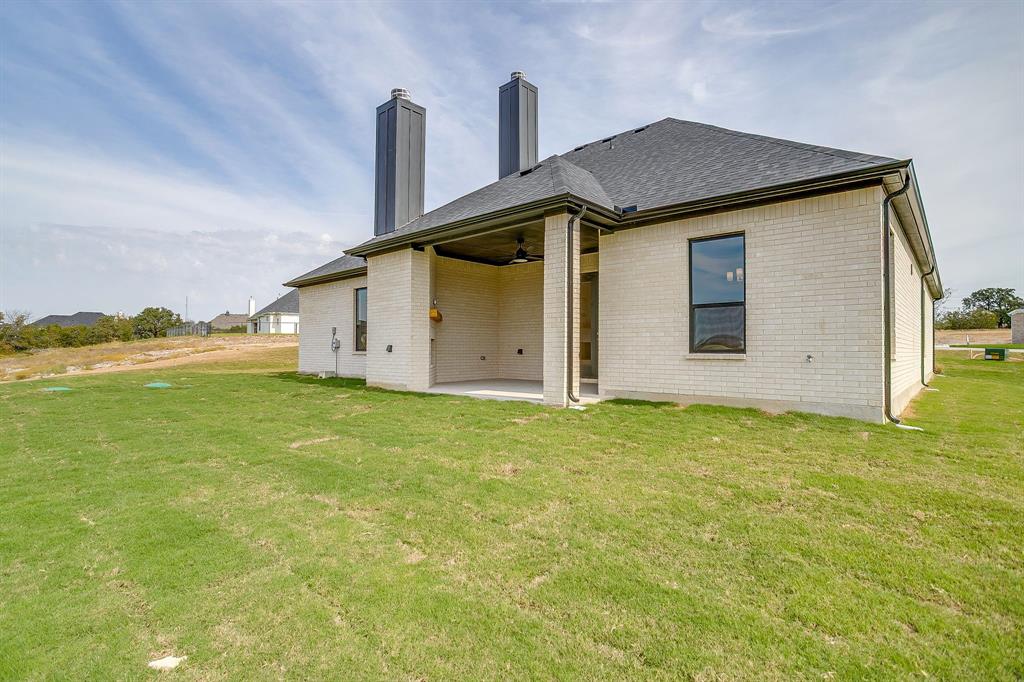 320 Slimp Bluff Azle, TX 76020 - Photo 36 of 37 a front view of house with yard