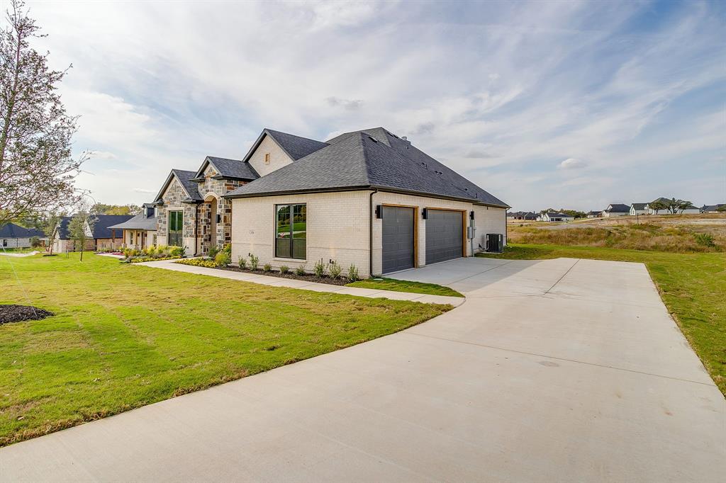 320 Slimp Bluff Azle, TX 76020 - Photo 37 of 37 a front view of house with yard and ocean