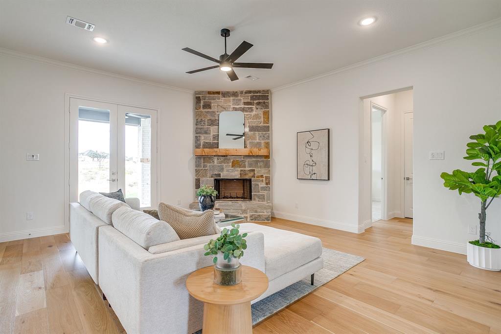 320 Slimp Bluff Azle, TX 76020 - Photo 8 of 37 a living room with furniture and a fireplace