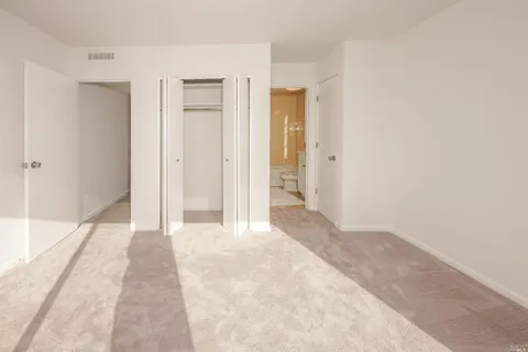 a view of a room with a flat screen tv