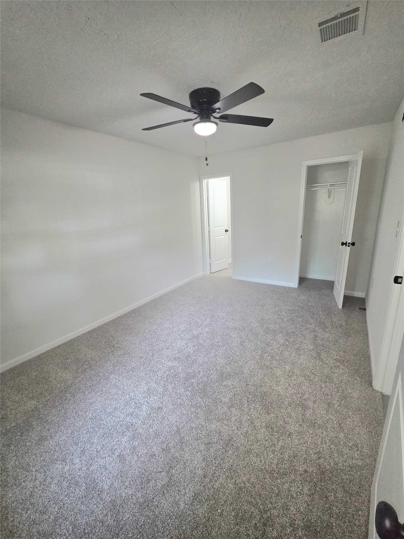 4931 Cosby Street Houston, TX 77021 - Photo 7 of 14 primary bedroom, showing entrance to attached bathroom and closet