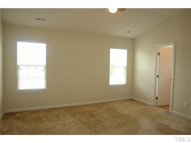 3551 Oneonta Avenue Raleigh, NC 27604 - Photo 7 of 12 a view of an empty room with a window