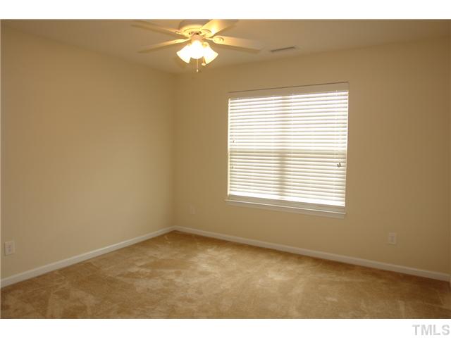 3551 Oneonta Avenue Raleigh, NC 27604 - Photo 9 of 12 a view of an empty room with a window