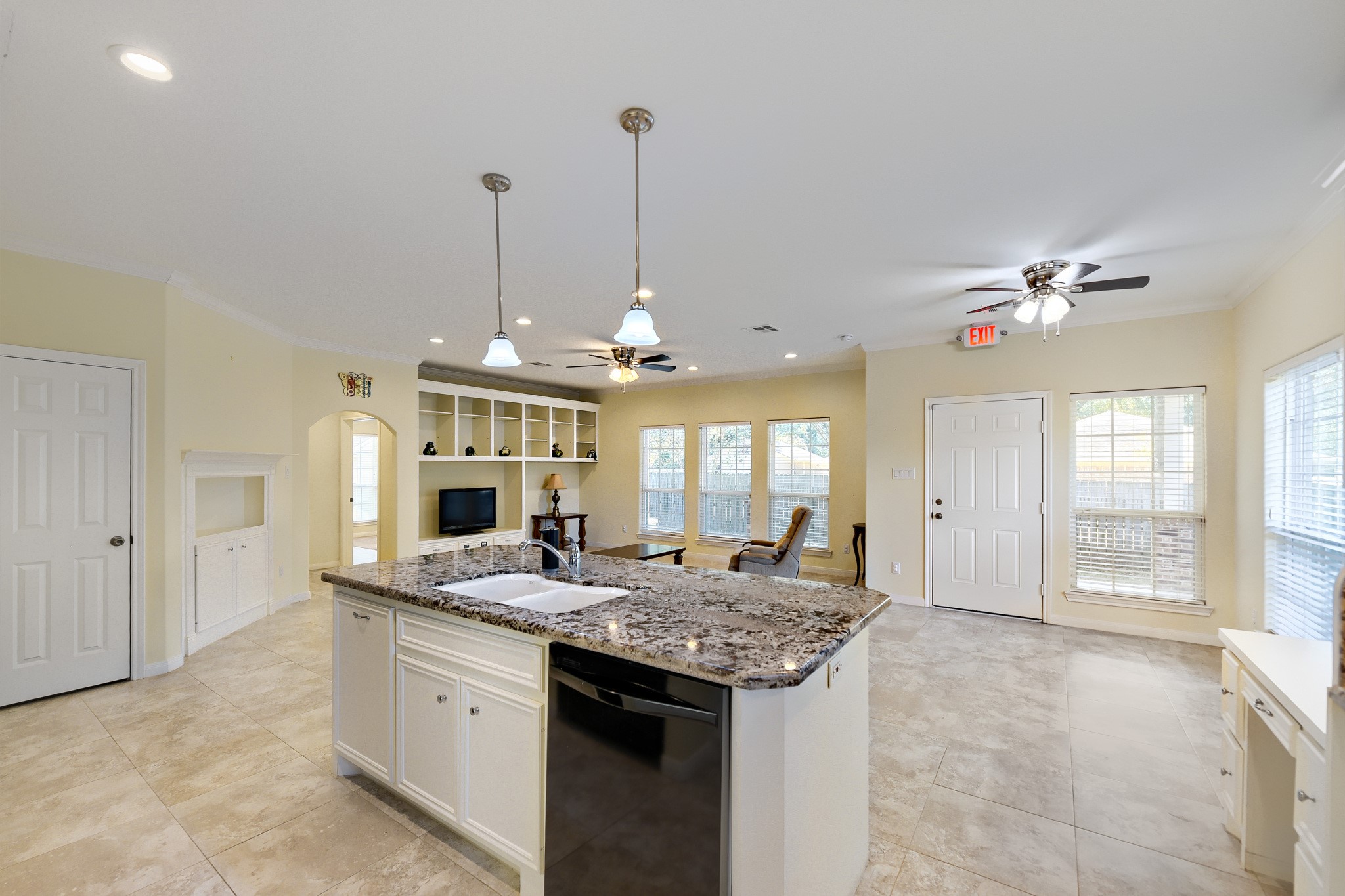 2215 Penick Road Waller, TX 77484 - Photo 9 of 33 Open concept living space with kitchen and large island
