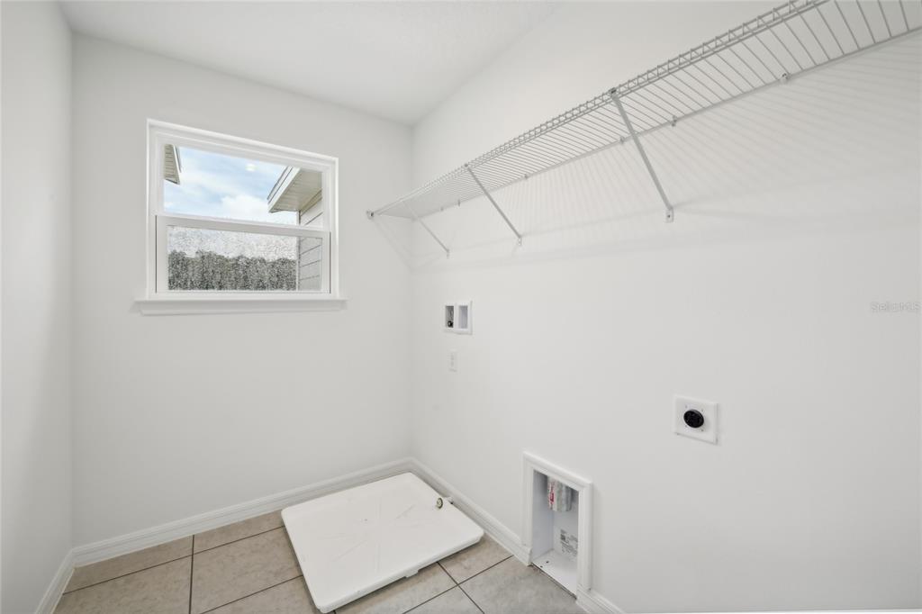 9596 Starling Loop Leesburg, FL 34788 - Photo 27 of 39 a view of an empty room