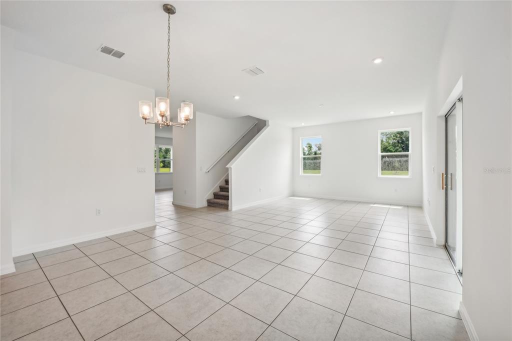 9596 Starling Loop Leesburg, FL 34788 - Photo 8 of 39 a view of an empty room with a window