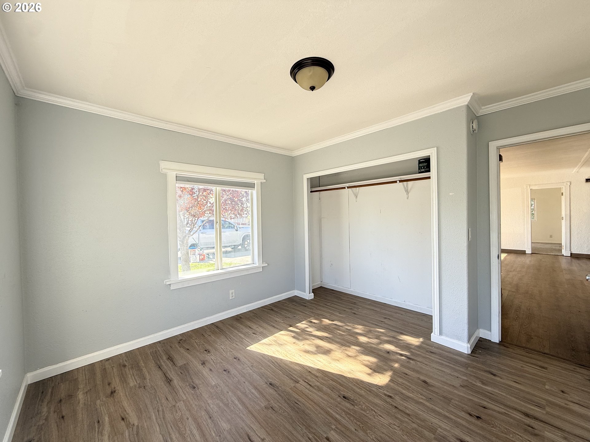 1330 West Sunland Avenue Hermiston, OR 97838 - Photo 12 of 23 a view of empty room with wooden floor