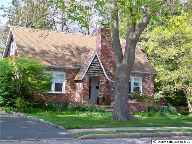1212 Wall Road, Unit W/ Spring Lake Heights, NJ 07762 - Photo 2 of 3 front view of house with a yard