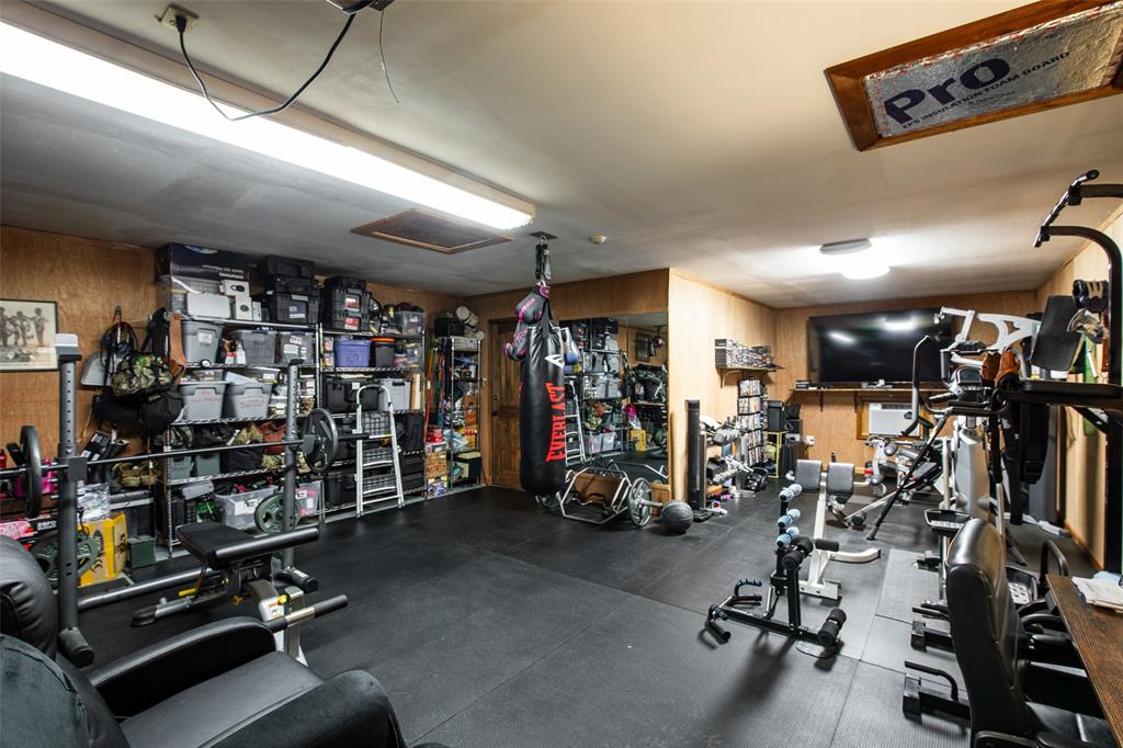 2043 Huddleston Road Sunset, TX 76270 - Photo 15 of 36 a view of a room with gym equipment