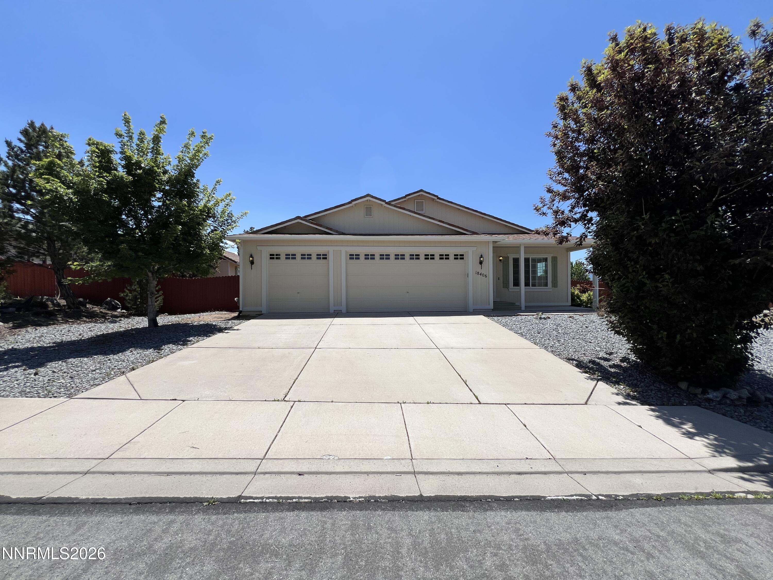 18406 Teddy Bear Court Reno, NV 89508 - Photo 1 of 44 a front view of a house with a yard
