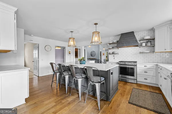 a spacious bedroom with a bed and a window