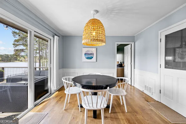 a en suite bathroom with a granite countertop sink and a mirror