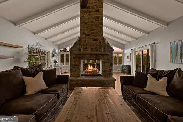 a view of a kitchen with a sink and a dishwasher