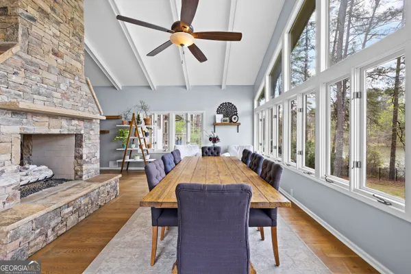 a bedroom with a bed a dresser and book shelf