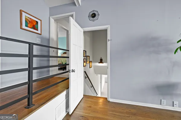 a view of a lake with houses in the back