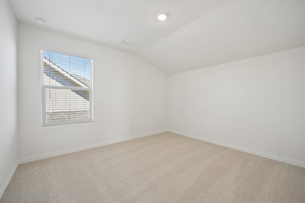 1705 Arches Road Anna, TX 75409 - Photo 27 of 33 an empty room with a window