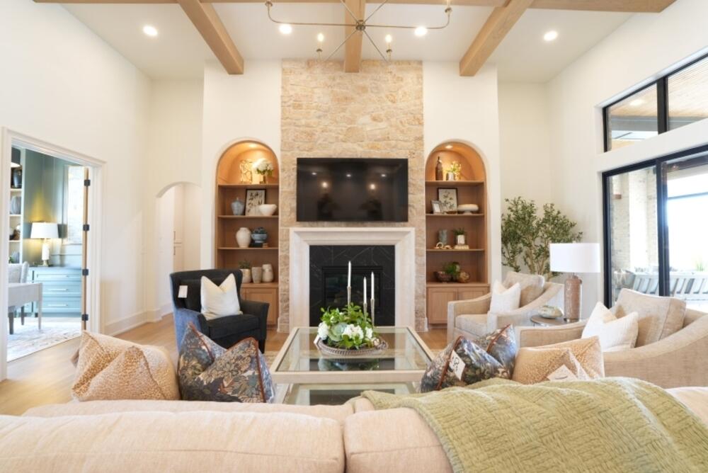 4101 149th Street Lubbock, TX 79423 - Photo 8 of 53 a living room with furniture a fireplace and a flat screen tv