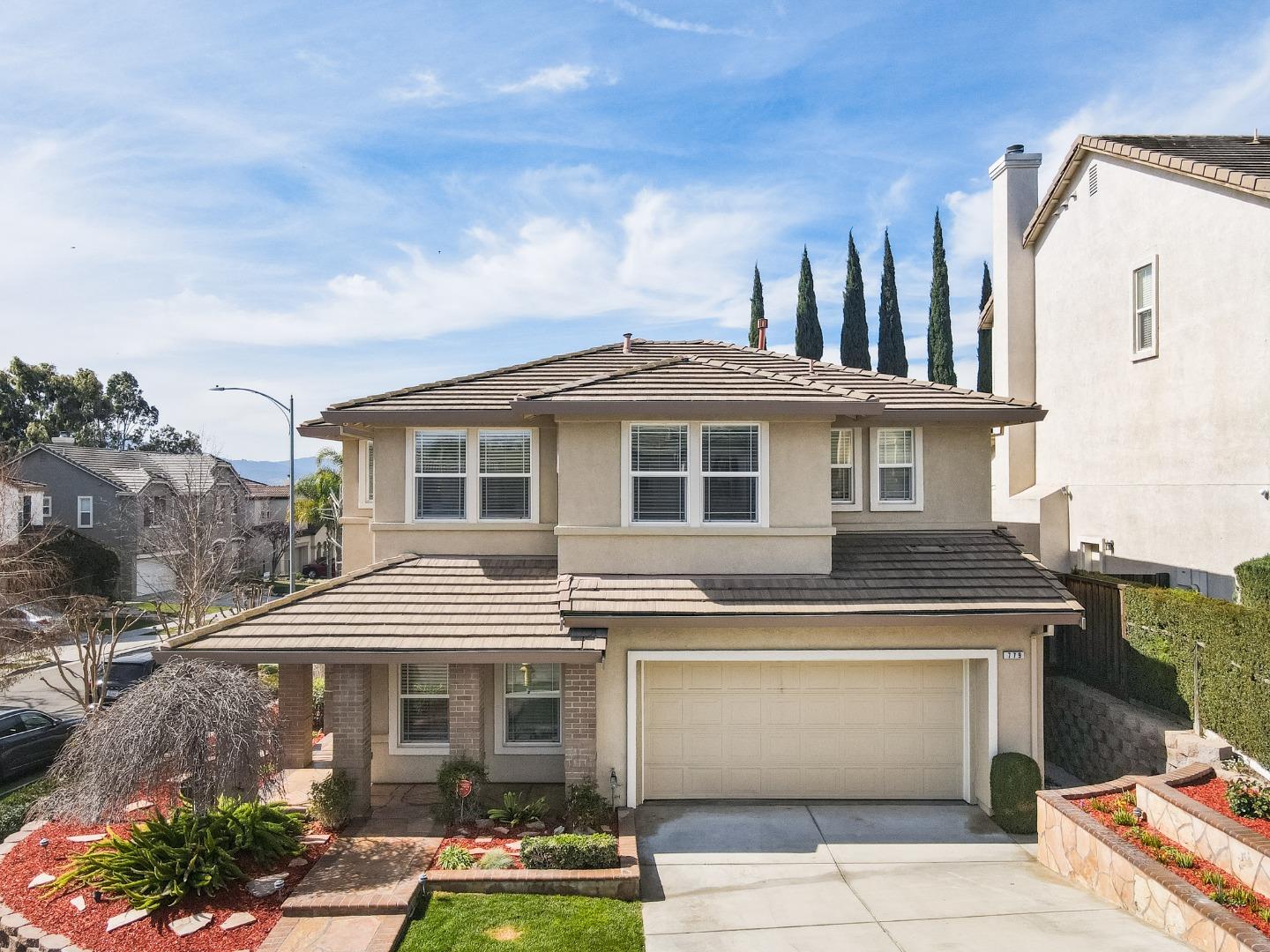 779 Canoas Creek Circle San Jose, CA 95136 - Photo 2 of 58 a front view of a residential apartment building with a yard