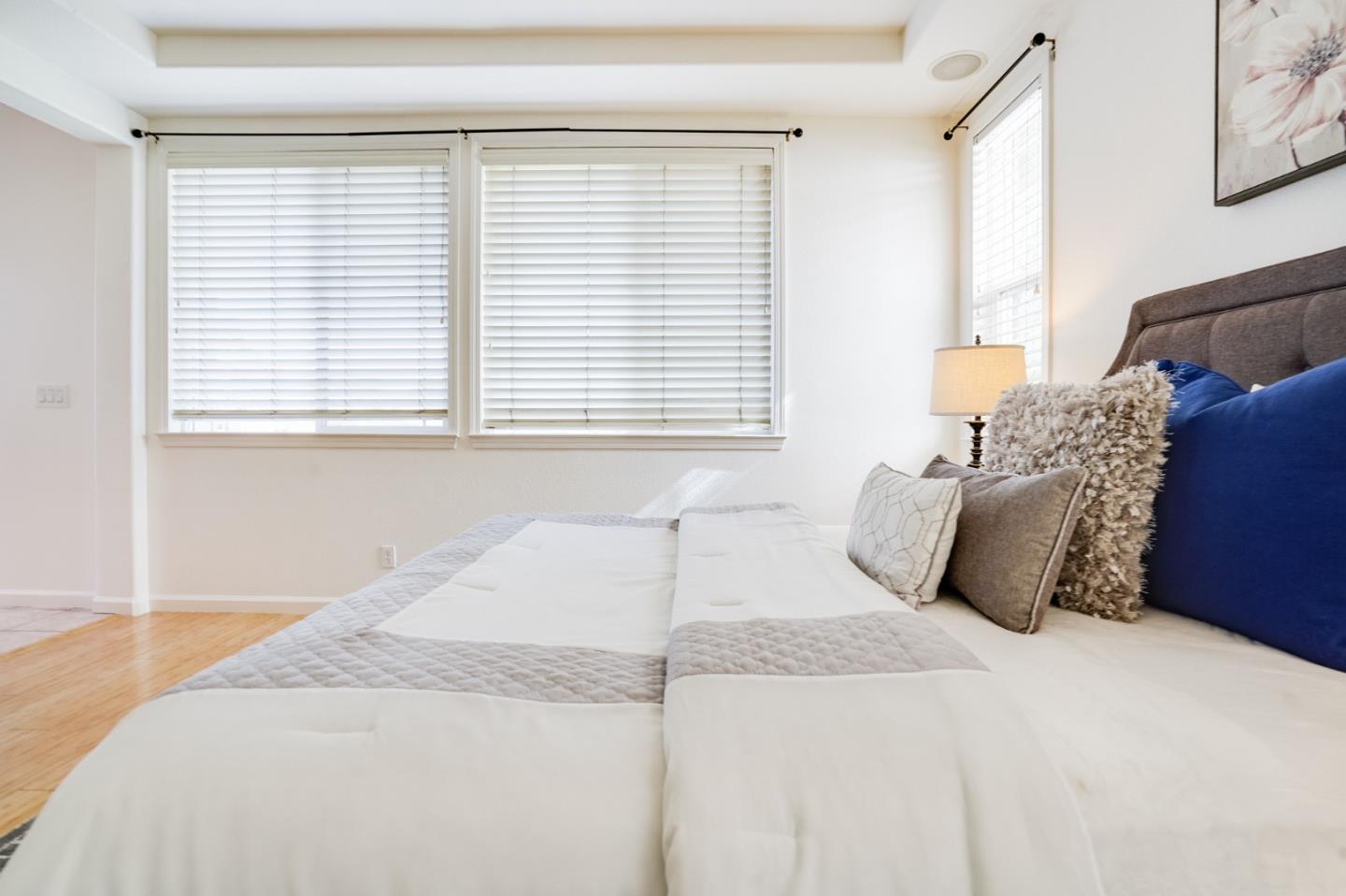 779 Canoas Creek Circle San Jose, CA 95136 - Photo 32 of 58 a bedroom with a bed and a window