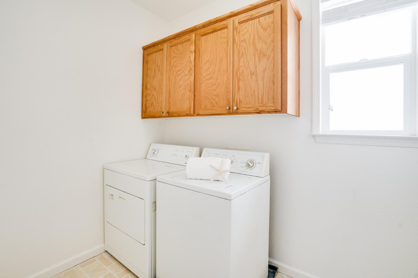 779 Canoas Creek Circle San Jose, CA 95136 - Photo 42 of 58 a utility room with dryer and washer