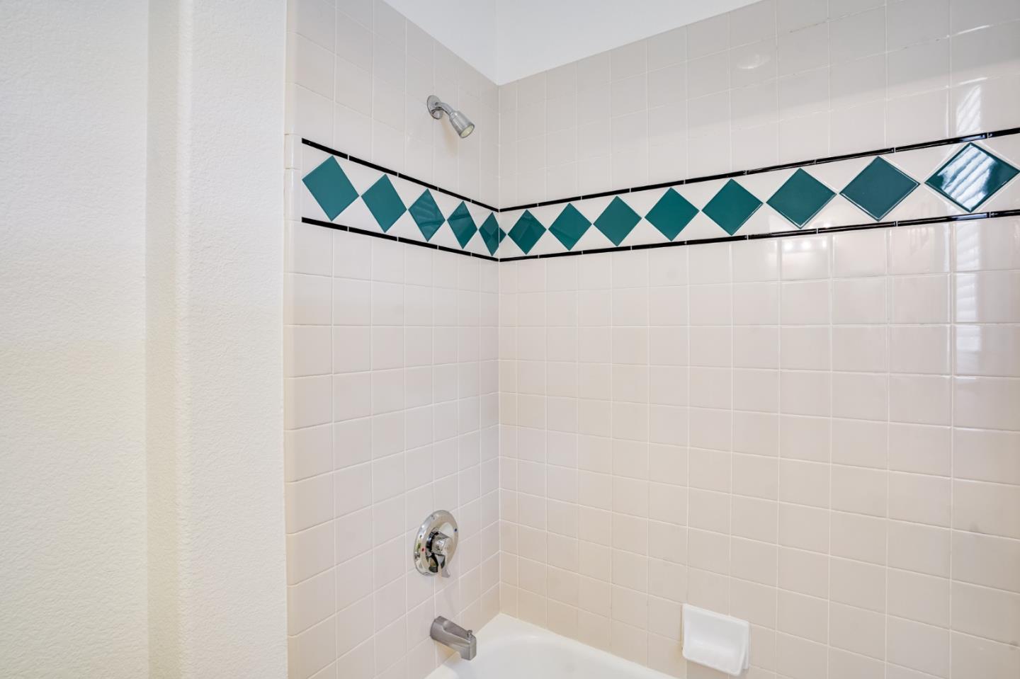 779 Canoas Creek Circle San Jose, CA 95136 - Photo 44 of 58 a bathroom with a shower and a sink