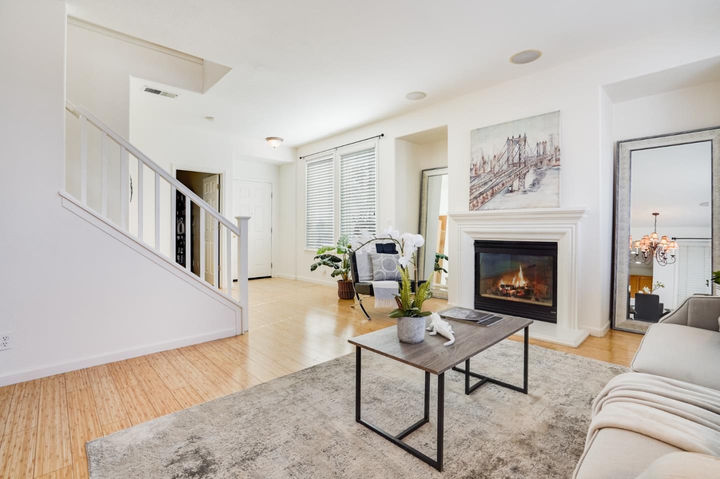 779 Canoas Creek Circle San Jose, CA 95136 - Photo 9 of 58 a living room with furniture and a fireplace