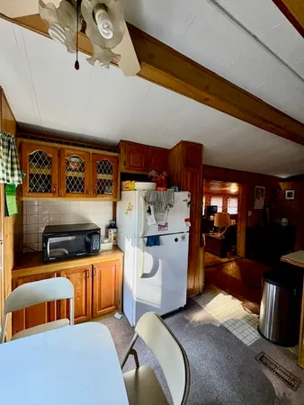 a bedroom with furniture and wooden floor
