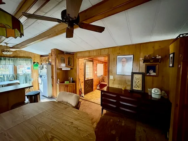 a bedroom with a bed and a night stand