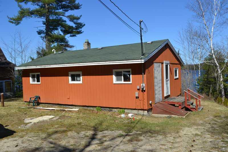233 Flanders Pond Road Sullivan, ME 04664 - Photo 1 of 10 Exterior Front. Driveway side