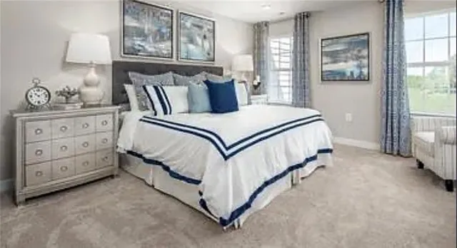 a bed room with a bed and a night stand