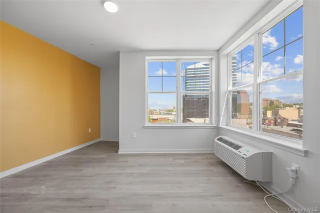 a view of an empty room with a window