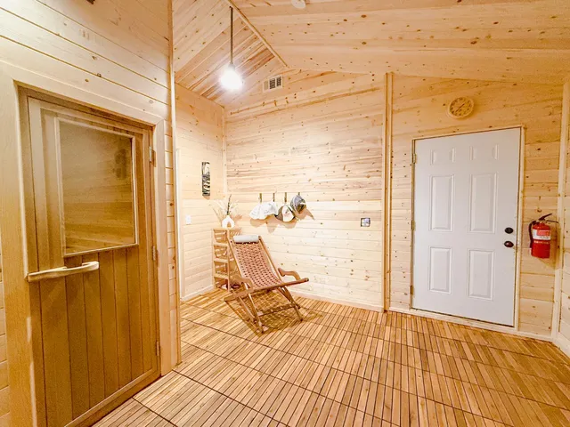 a view of outdoor space with trees all around