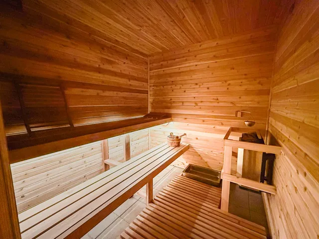 a view of yard with trees in the background