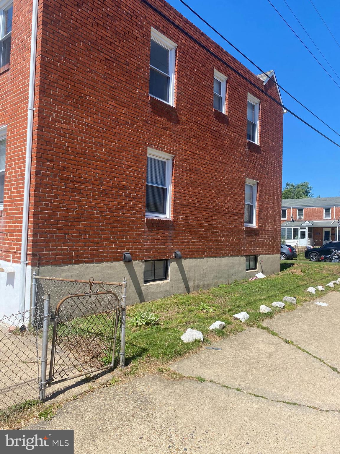 3643 Greenvale Road Baltimore, MD 21229 - Photo 2 of 23 a brick building that has a lots of windows in it
