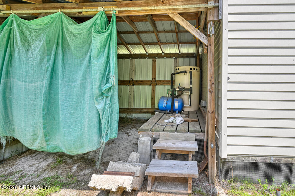 7837 Rusty Anchor Road St. Augustine, FL 32092 - Photo 32 of 41 Septic Pump House