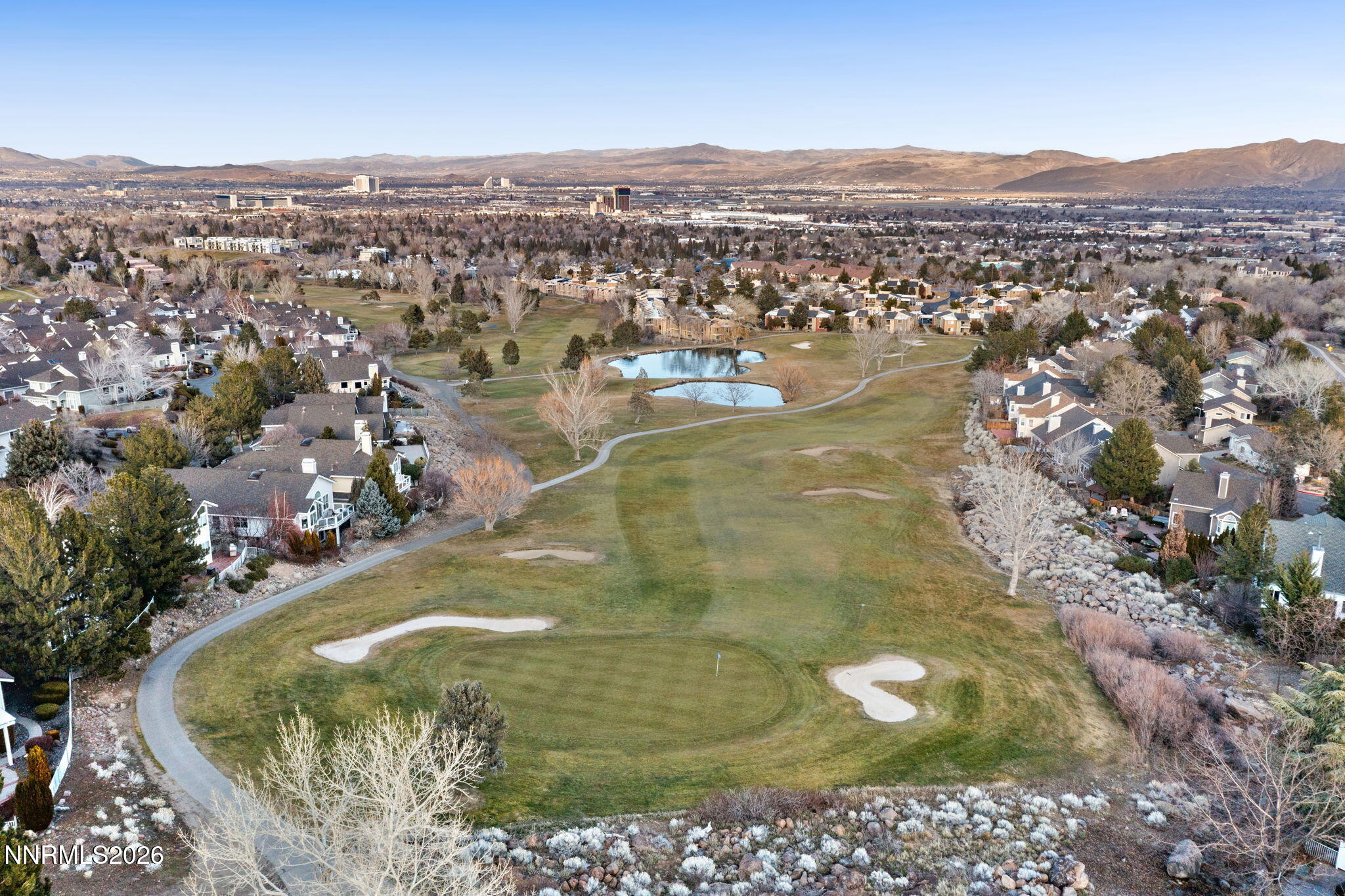 6186 Squires Lane Reno, NV 89519 - Photo 49 of 57 an aerial view of residential houses with outdoor space