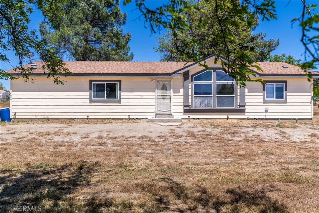 56080 Pena Road Anza, CA 92539 - Photo 1 of 1 a front view of a house with garden
