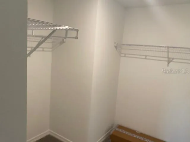 a view of a room with racks on the wall