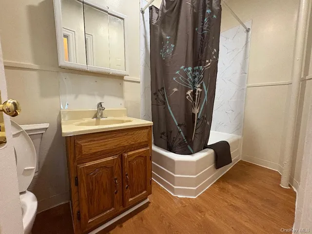 a utility room with a sink a washer and dryer