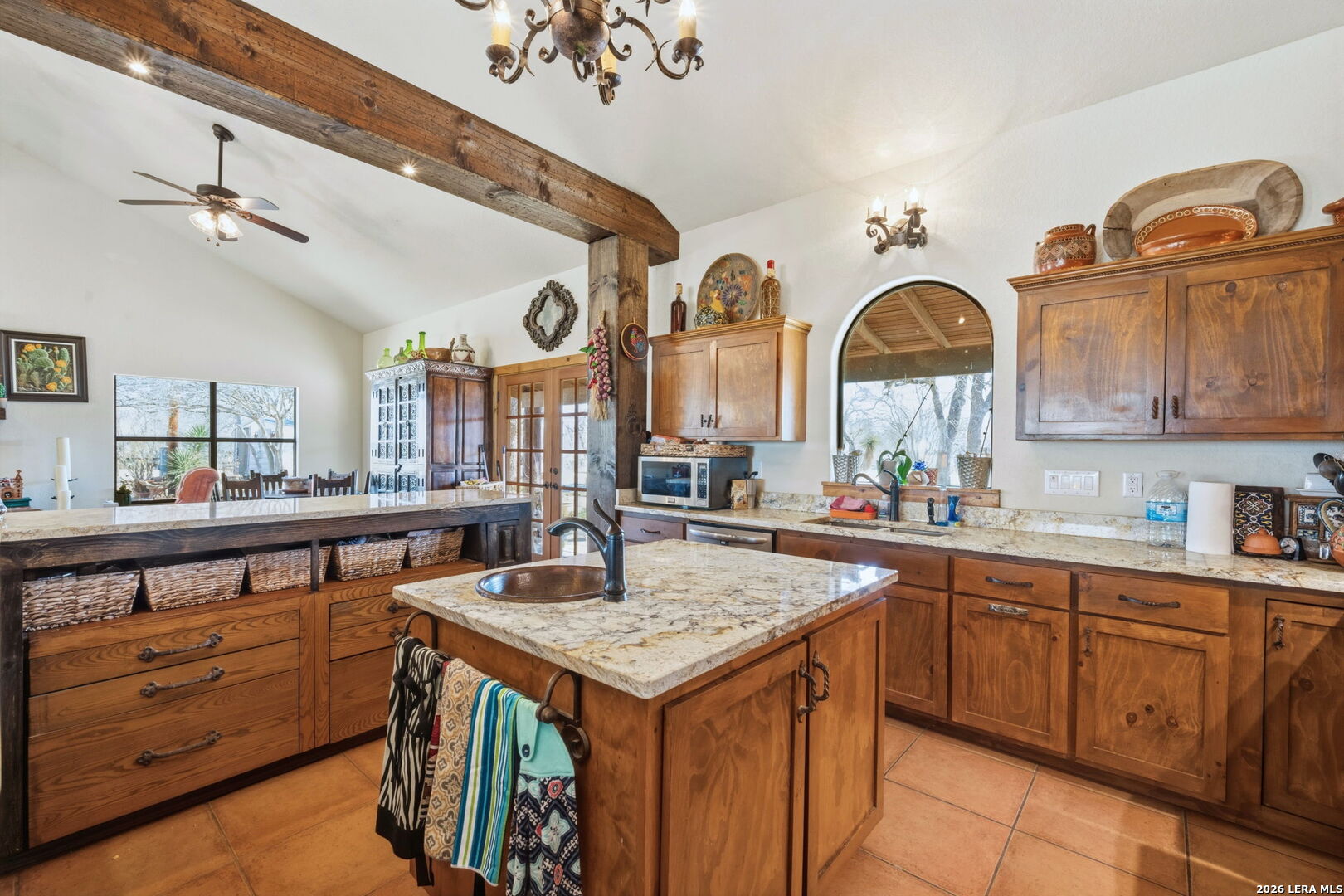 1150 Bruce Road Poteet, TX 78065 - Photo 13 of 33 a view of a kitchen with cabinets