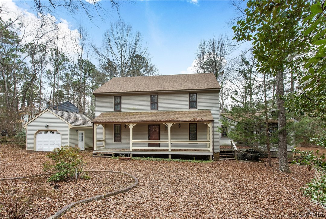 a house with trees in the background