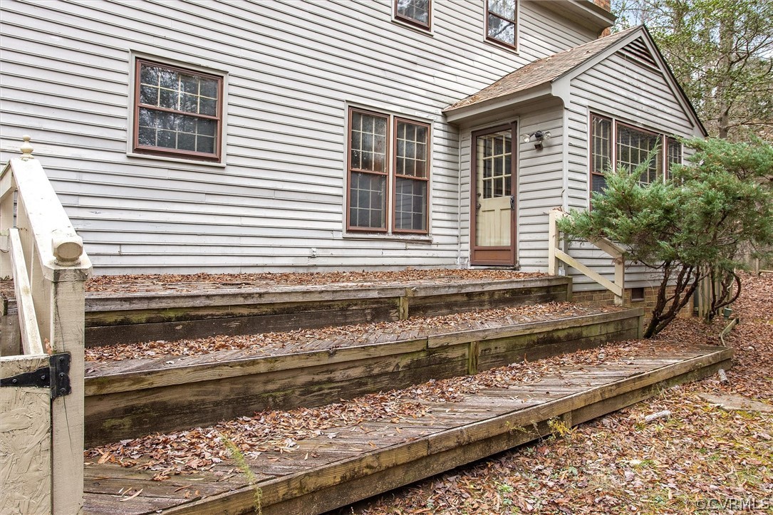 3802 Pebble Creek Road Midlothian, VA 23112 - Photo 20 of 25 a front view of a house with a yard