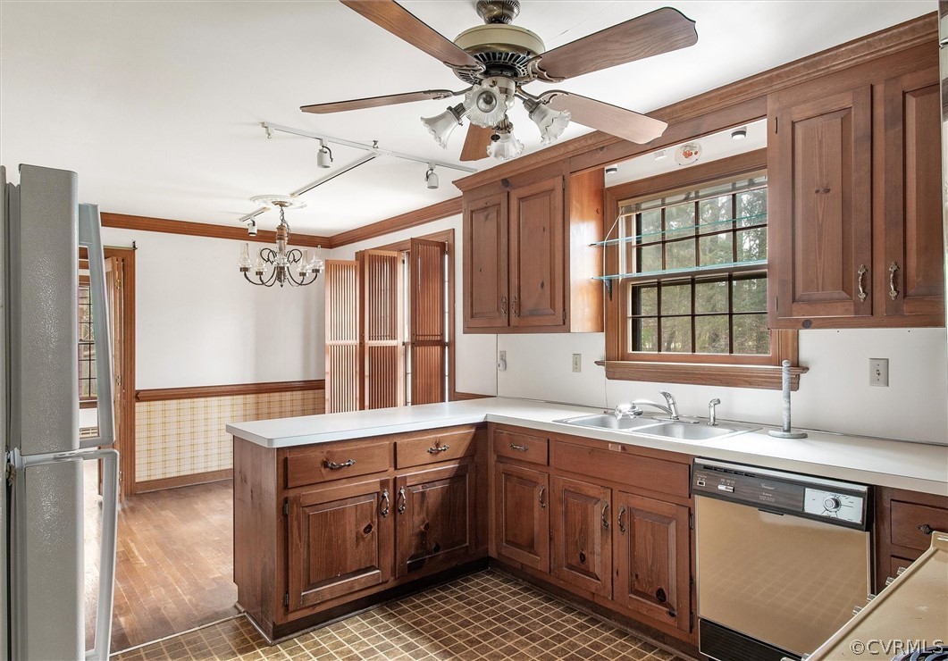 3802 Pebble Creek Road Midlothian, VA 23112 - Photo 9 of 25 a kitchen with a sink stove and refrigerator